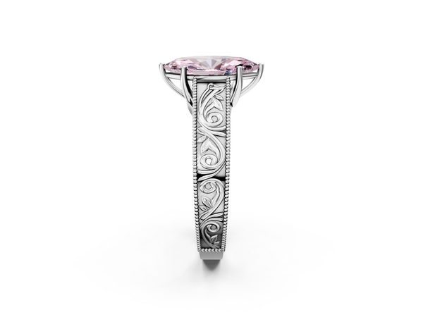 White gold Fancy Pink Marquise Cut Diamond Solitaire Ring with Engraved Band and Four-Prong Setting