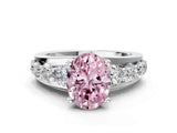 White gold Fancy Pink Oval  Brilliant Solitaire with Side Stones on a Pave Band and Four-Prong Setting_61