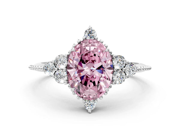 White gold Fancy Pink Oval Cut Brilliant Diamond with Cluster Setting on a Beaded Band and Four-Prong Setting