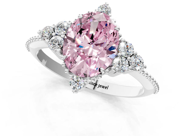 White gold Fancy Pink Oval Cut Brilliant Diamond with Cluster Setting on a Beaded Band and Four-Prong Setting