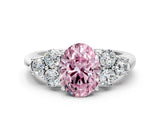 White gold Fancy Pink Oval  Cut Diamond Cluster Ring with Round Accent Stones and Prong Setting on a Classic Band_49