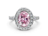 White gold Fancy Pink Oval Cut Diamond Halo Ring with Pavé Band and Prong Setting