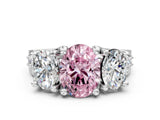 White gold Fancy Pink Oval Cut Diamond Three-Stone Ring with Channel Set Band and Four-Prong Setting_61