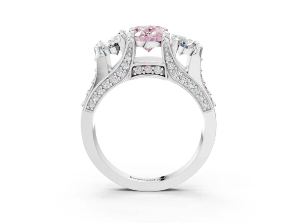 Platinum Fancy Pink Oval Cut Diamond Three-Stone Ring with Channel Set Band and Four-Prong Setting