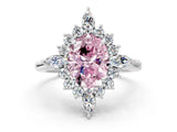 White gold Fancy Pink Oval Cut Halo Diamond Cluster Ring with Marquise and Round Stones on a White Gold Band with Prong Setting