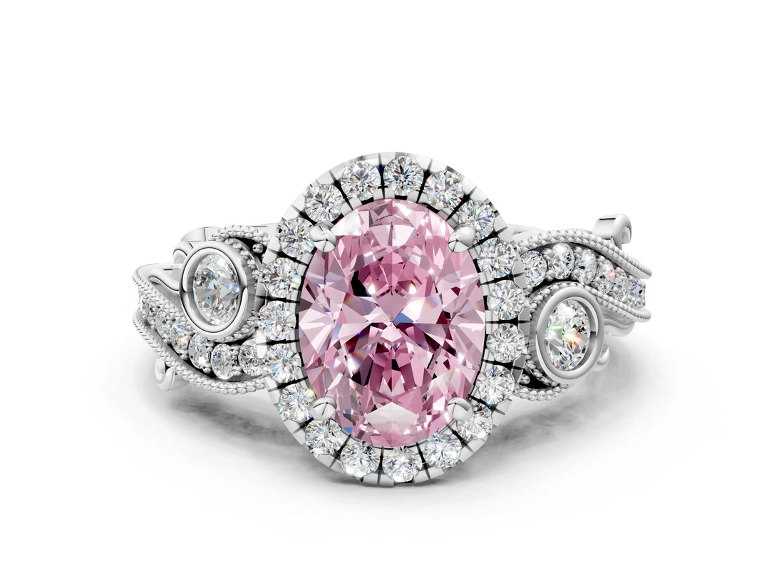 White gold Fancy Pink Oval Cut Halo Diamond Ring with Milgrain and Bezel Accents on a Split Shank Band