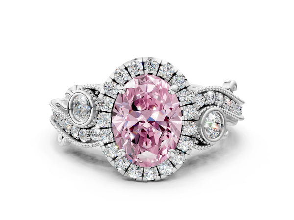 White gold Fancy Pink Oval Cut Halo Diamond Ring with Milgrain and Bezel Accents on a Split Shank Band