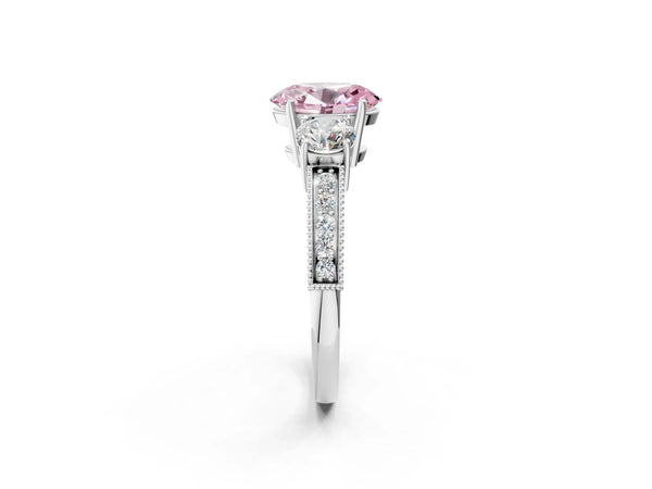 Platinum Fancy Pink Oval Cut Three-Stone Diamond Ring with Pavé Band and Four-Prong Setting