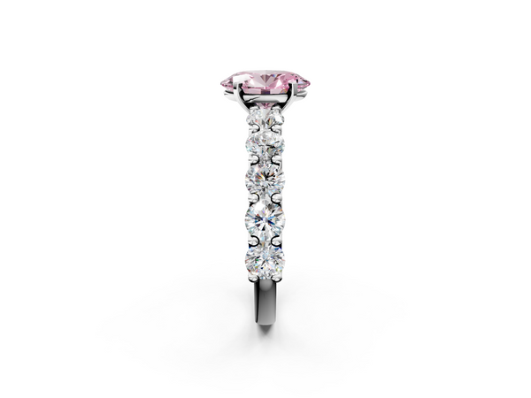 Platinum Fancy Pink Oval Cut Diamond Prong Setting with Side Stones on a Pave Band
