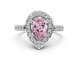White gold Fancy Pink Pear Cut Diamond Halo Ring with Pavé Band and Prong Setting