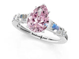 White gold Fancy Pink Pear  Cut Diamond Ring with Baguette Side Stones, Channel Set Band, and Four-Prong Setting_37
