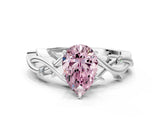 White gold Fancy Pink Pear Cut Diamond Solitaire Ring with Twisted Band and Prong Setting_350
