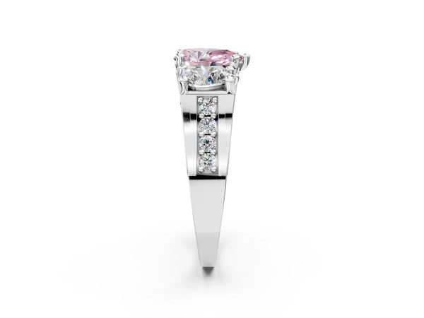 Platinum Fancy Pink Pear Cut Diamond Three-Stone Ring with Channel Set Band and Four-Prong Setting