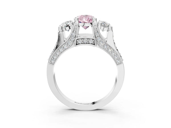 Platinum Fancy Pink Pear Cut Diamond Three-Stone Ring with Channel Set Band and Four-Prong Setting