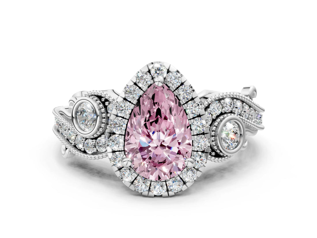 White gold Fancy Pink Pear Cut Halo Diamond Ring with Milgrain and Bezel Accents on a Split Shank Band