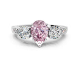 White gold Fancy Pink Pear Cut Three-Stone Diamond Ring with Pavé Band and Four-Prong Setting