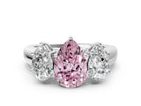 White gold Fancy Pink Pear Cut Three-Stone Diamond Ring with Prong Setting on a Classic Band_12