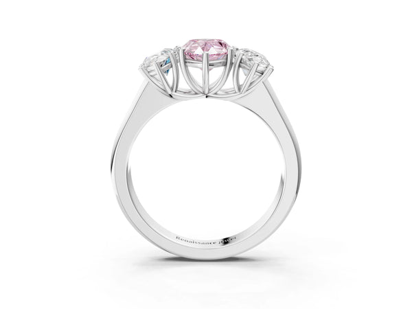 Platinum Fancy Pink Pear Cut Three-Stone Diamond Ring with Prong Setting on a Classic Band