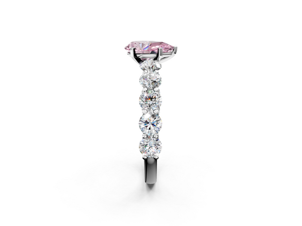White gold Fancy Pink Pear Cut Diamond Prong Setting with Side Stones on a Pave Band