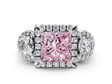 White gold Fancy Pink Princess Cut Diamond Three-Stone Halo Ring with Prong Setting and Pavé Accents