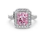 White gold Fancy Pink Radiant Cut Diamond Halo Ring with Pavé Band and Prong Setting
