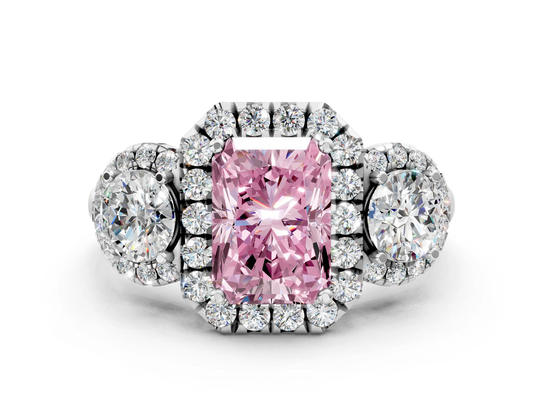 White gold Fancy Pink Radiant Cut Diamond Three-Stone Halo Ring with Prong Setting and Pavé Accents