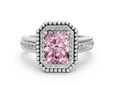 White gold Fancy Pink Radiant Cut Halo Diamond Ring with Beaded Split Shank and Four-Prong Setting