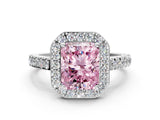 White gold Fancy Pink Radiant Cut Halo Diamond Ring with Pavé Band and Three-Prong Setting_12