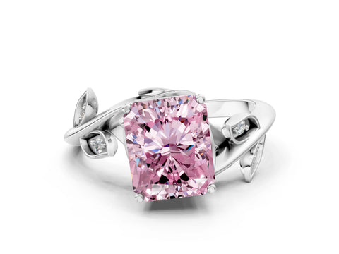 White gold Fancy Pink Radiant Cut Solitaire Twist Engagement Ring with Leaf Accents and Prong Setting