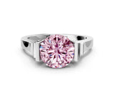 White gold Fancy Pink Round Cut Brilliant Solitaire Diamond Ring with Channel Set Band and Bar Prong Setting