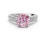 White gold Fancy Pink Round Cut Cut Pave Split Shank Engagement Ring with Four-Prong Setting