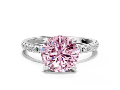 White gold Fancy Pink Round Cut Diamond Brilliant Solitaire Ring with Pavé Band and Four-Prong Setting