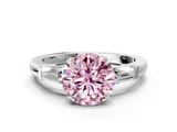 White gold Fancy Pink Round  Cut Diamond Ring with Tapered Baguette Side Stones in Four-Prong Setting