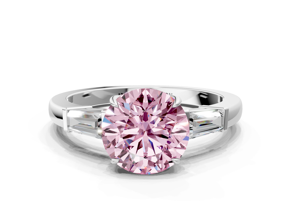 White gold Fancy Pink Round  Cut Diamond Ring with Tapered Baguette Side Stones in Four-Prong Setting