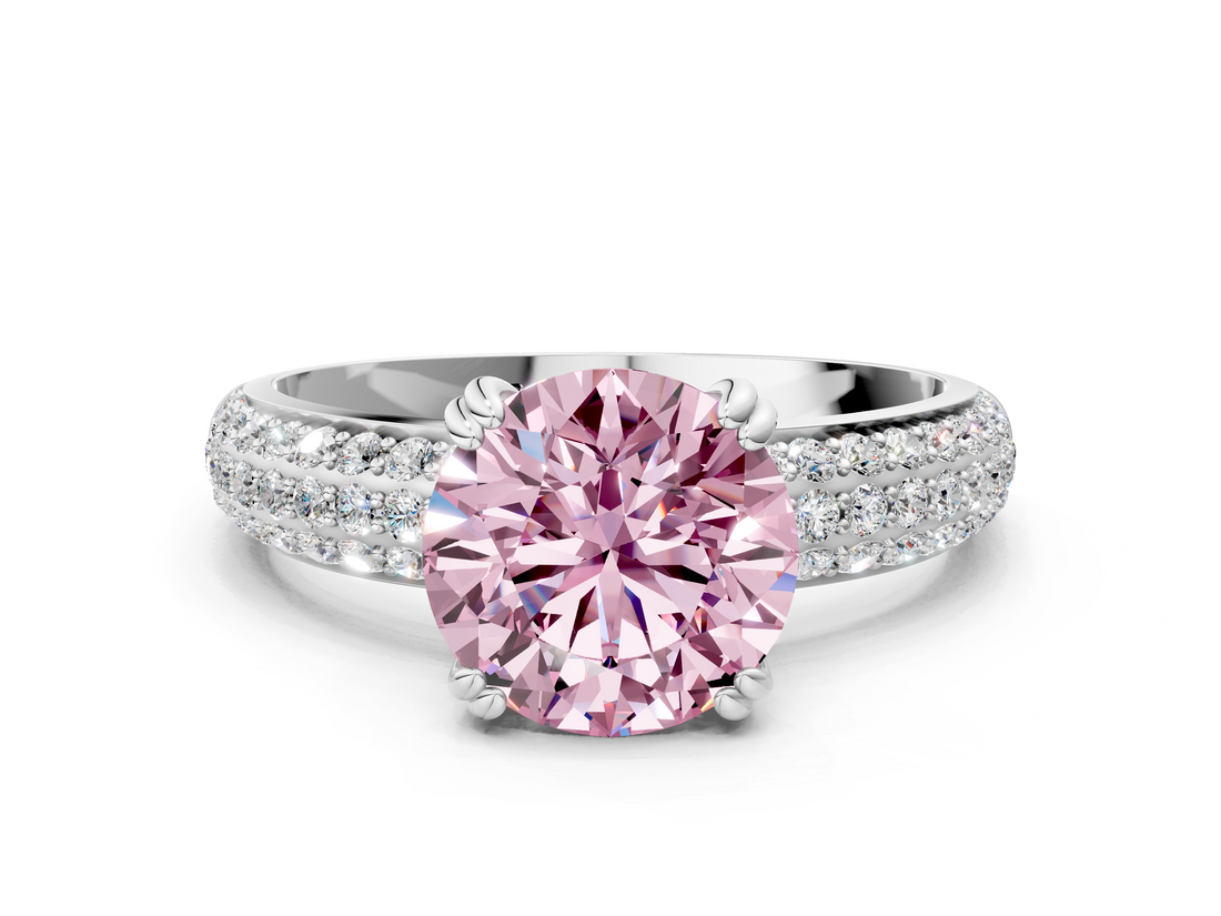 White gold Fancy Pink Round  Cut Pave Diamond Engagement Ring with Channel Set Band and Four-Prong Setting