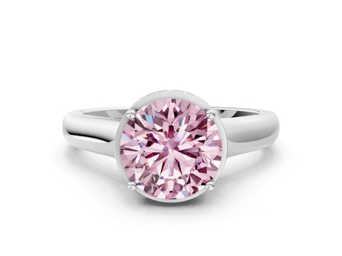 White gold Fancy Pink Round Cut Solitaire Diamond Engagement Ring with Four-Prong Setting and Tapered Band
