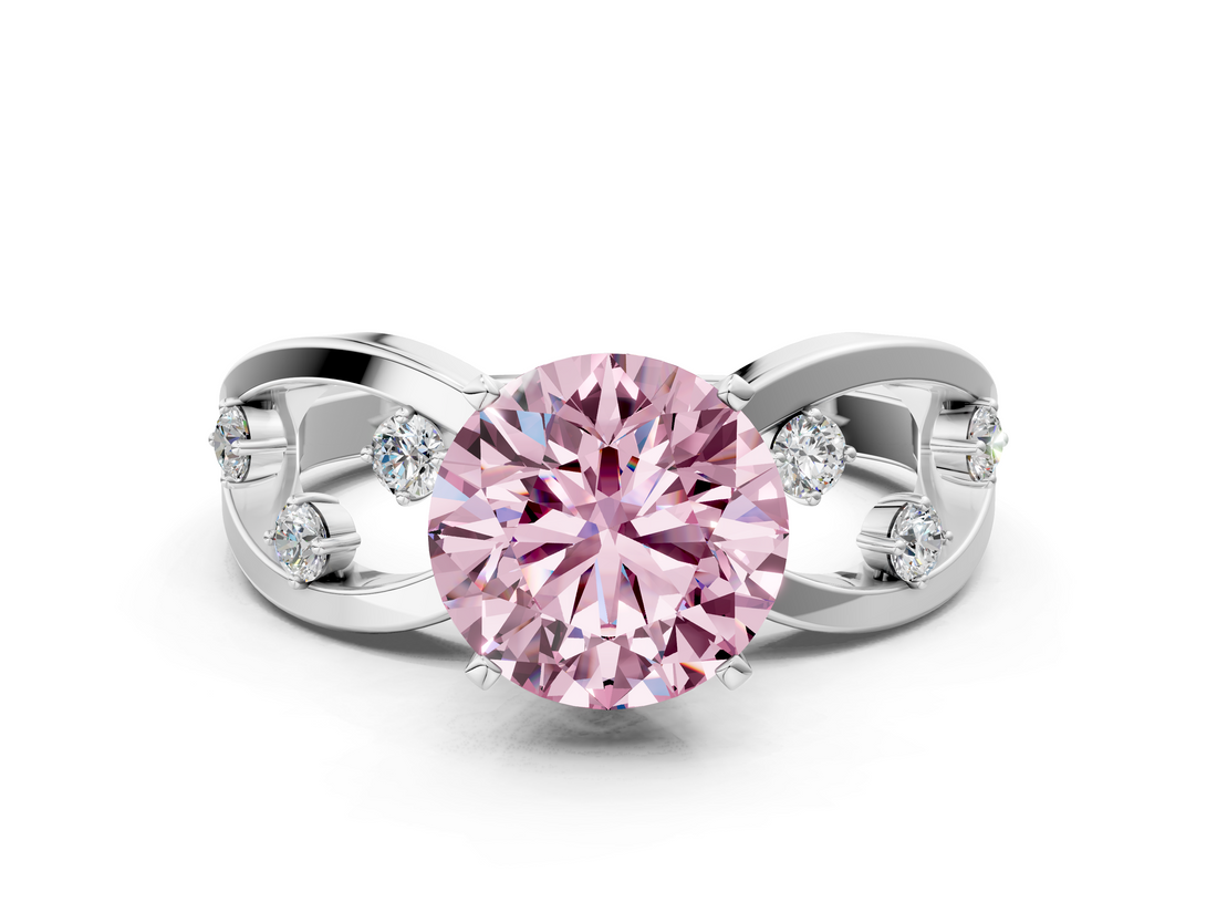 White gold Fancy Pink Round  Cut Solitaire Diamond with Side Stones on Criss-Cross Band and Four-Prong Setting
