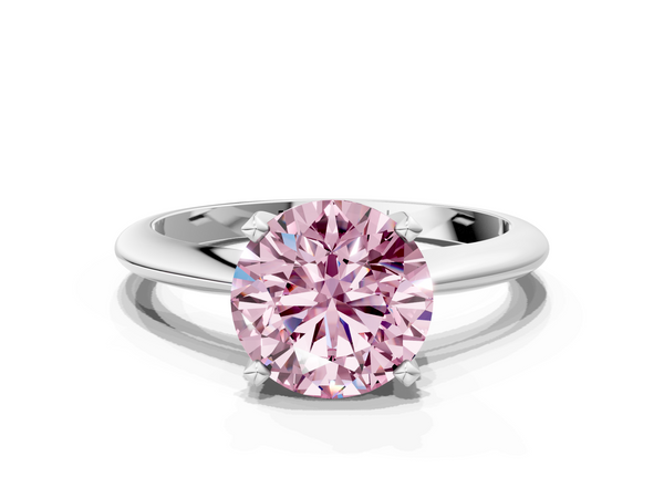 Platinum Fancy Pink Round  Cut Solitaire Ring with Four-Prong Setting on a Classic Band