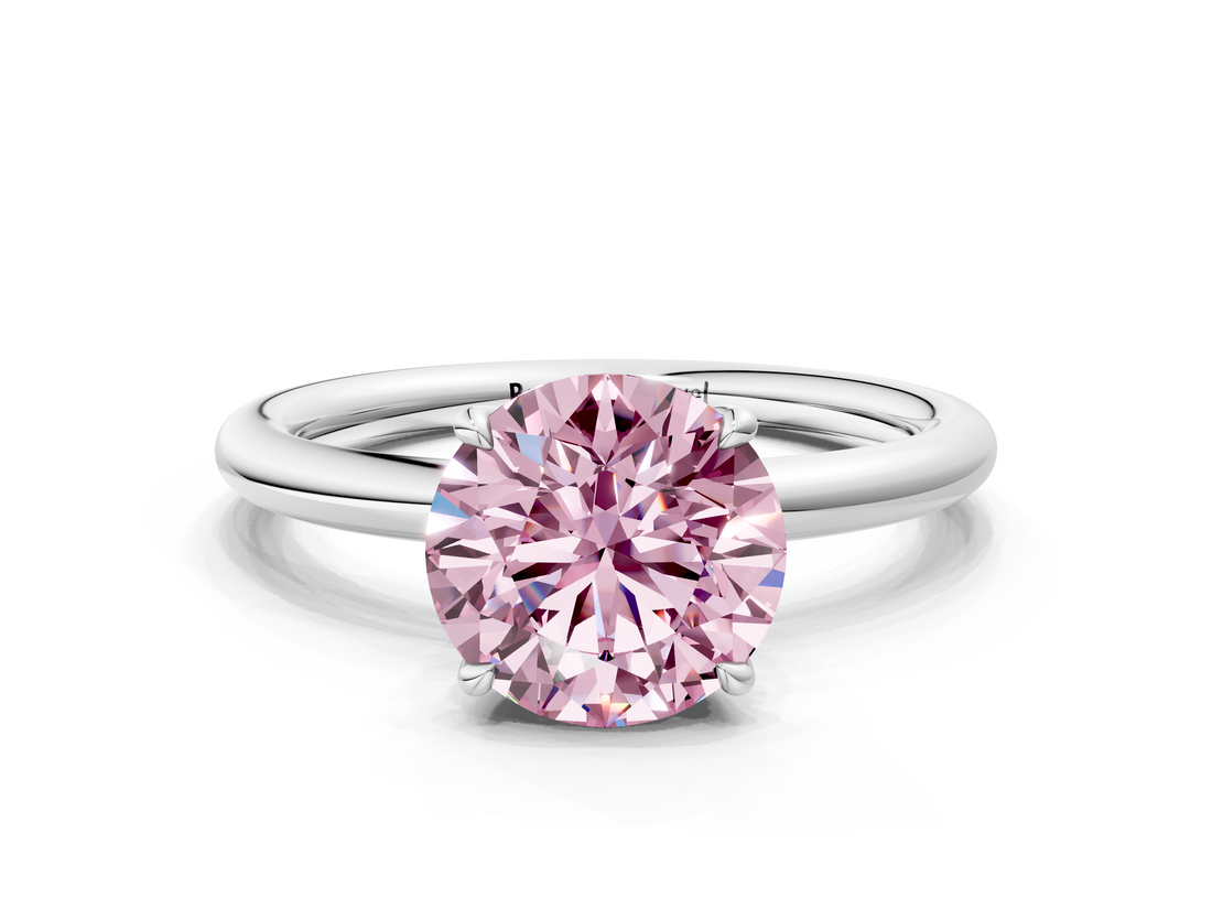 White gold Fancy Pink Round  Cut Solitaire Ring with Thin Band and Four-Prong Setting