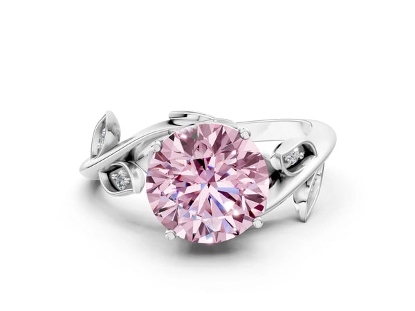 Platinum Fancy Pink Round Cut Solitaire Twist Engagement Ring with Leaf Accents and Prong Setting