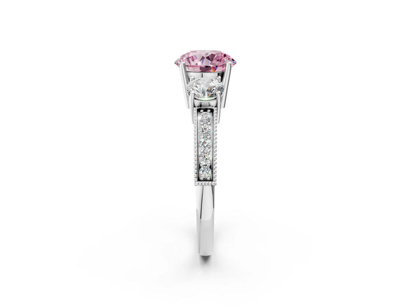White gold Fancy Pink Round Cut Three-Stone Diamond Ring with Pavé Band and Four-Prong Setting