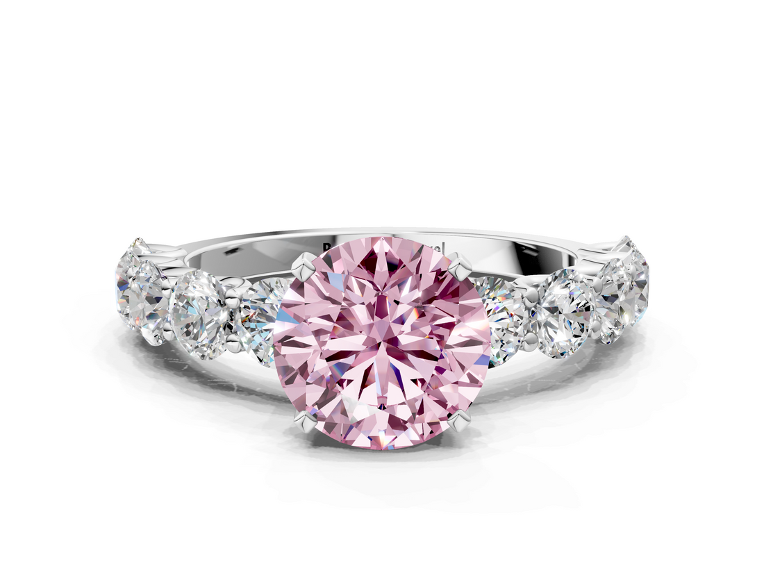 White gold Fancy Pink Round  Diamond Prong Setting with Side Stones on a Pave Band