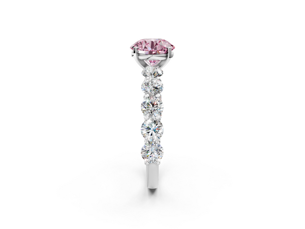 White gold Fancy Pink Round Cut Diamond Prong Setting with Side Stones on a Pave Band