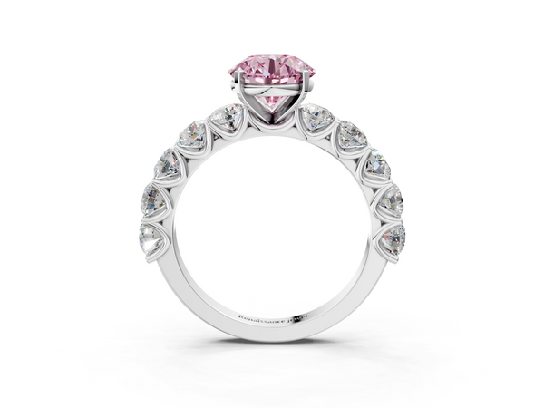 White gold Fancy Pink Round Cut Diamond Prong Setting with Side Stones on a Pave Band