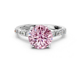 White gold Fancy Pink Round  Solitaire with Side Baguettes and Channel Set Band
