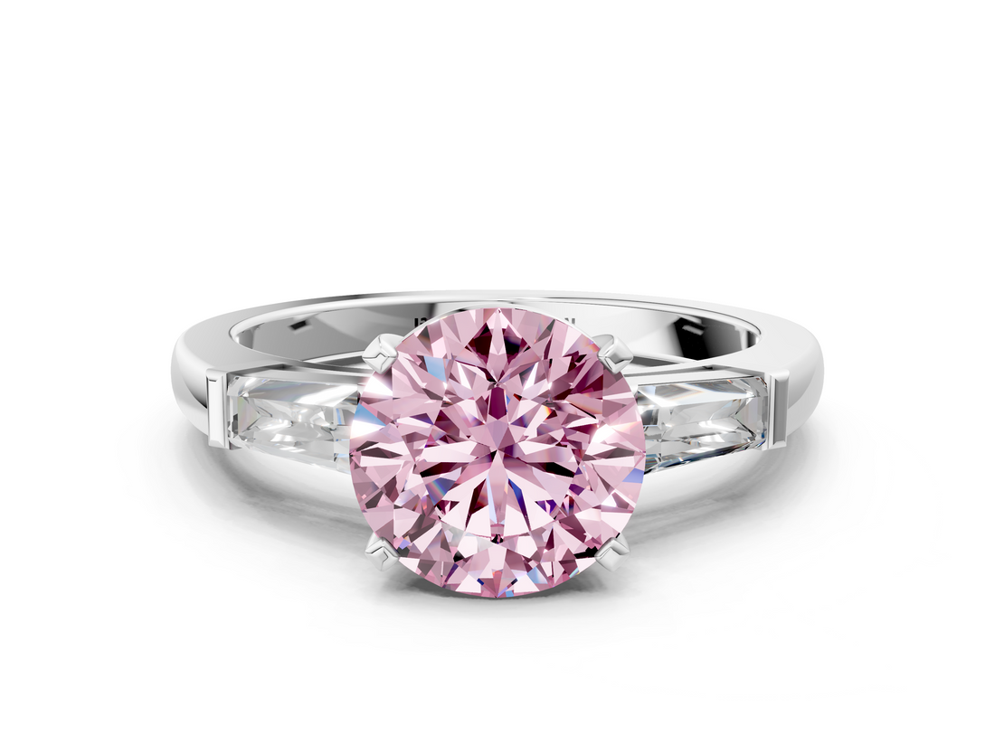 White gold Fancy Pink Round  Solitaire with Tapered Baguette Side Stones on a Classic Band with Four-Prong Setting