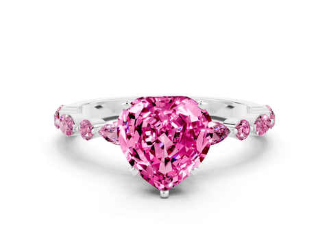 White gold Fancy White Heart Cut Pink Sapphire Solitaire with Side Stones on a Pavé Band and Four-Prong Setting