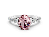 White gold Fancy White Oval Cut Morganite Solitaire Ring with Cathedral Setting and Pavé Band
