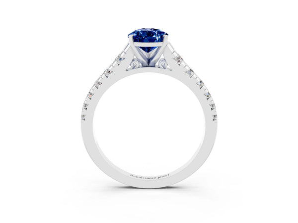 Silver Pear Cut Blue Sapphire Cathedral Solitaire Ring with Round  Pavé Band