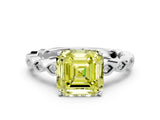 White gold Fancy Yellow Asscher Cut Solitaire Diamond Ring with Infinity Twist Band and Four-Prong Setting